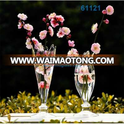 Wedding different size stemmed glass vases